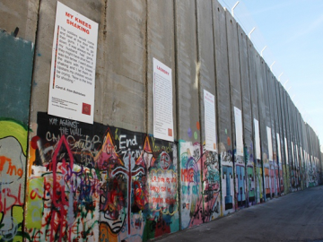Women's Stories are currently being exhibited on the Wall in Bethlehem.