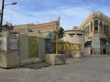The freedom of movement of Palestinians is significantly restricted within the city.