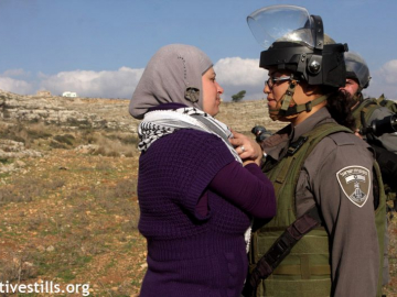 Peaceful protester face to face with Israeli soldier during Nabi Saleh's weekly non-violent protest.